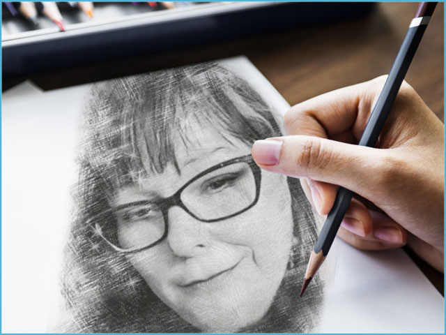 Drawn image of Soul To Soul Medium Eileen Casey Gonzalez on paper. Shows a pencil in a hand in the left lower corner of the page.